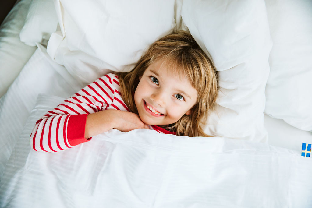 Barn som sover med Novistas tyngdtäcke